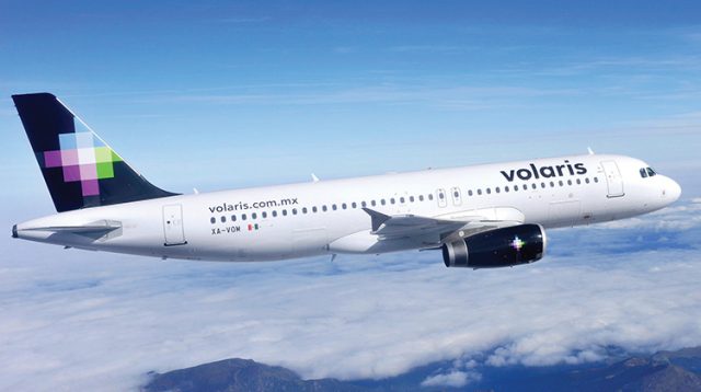 Volaris poses for workers with an absent union